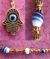 Preview: Lesezeichen Hamsa Hand mit schützendem Auge gold-blau - Handarbeit